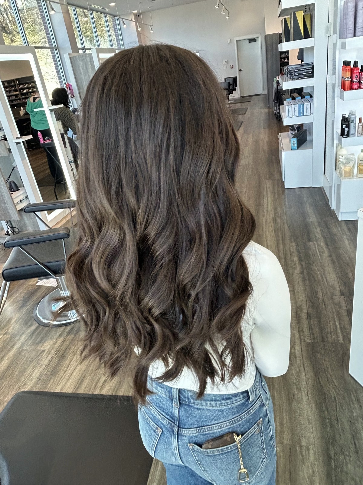 Brunette collarbone cut with lived-in waves