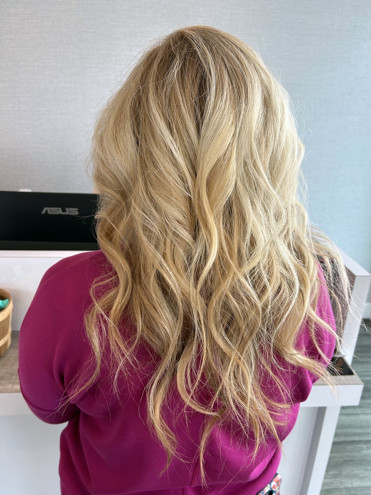 Long full blonde hair with beachy waves