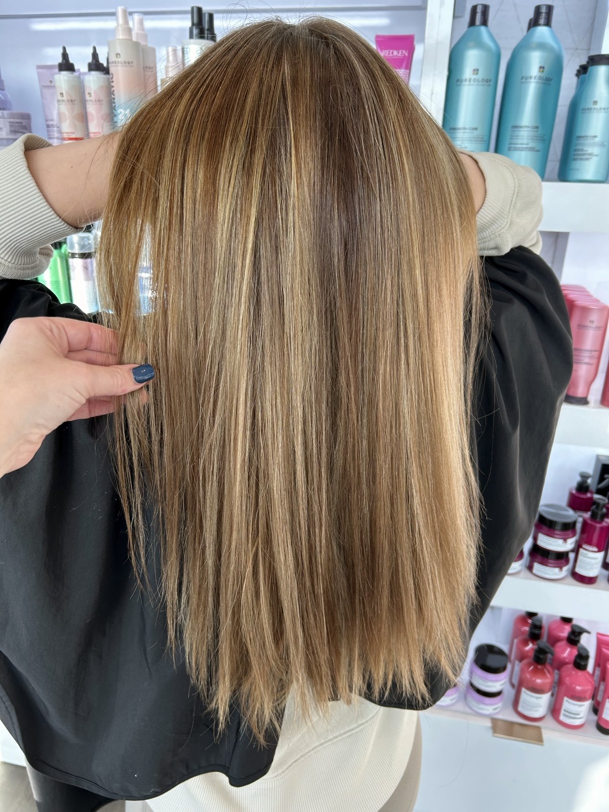 Sleek balayage with blunt ends